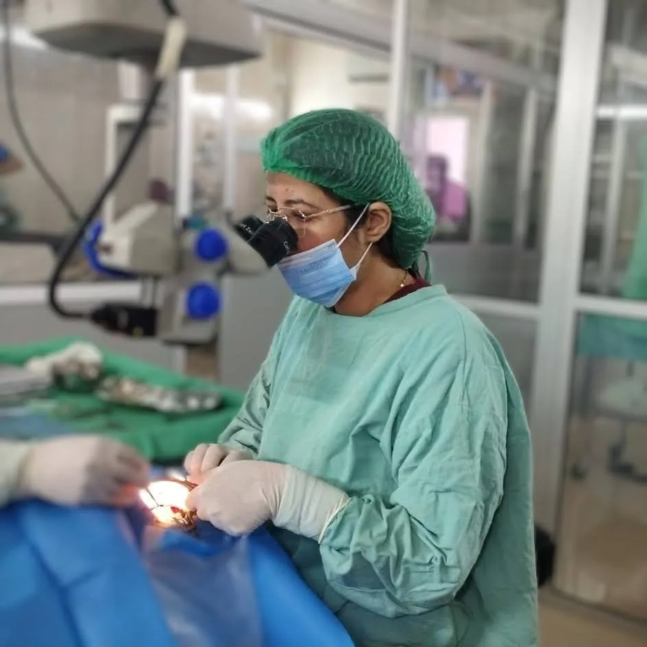 Dr. Fauzia Naureen performing eye surgery